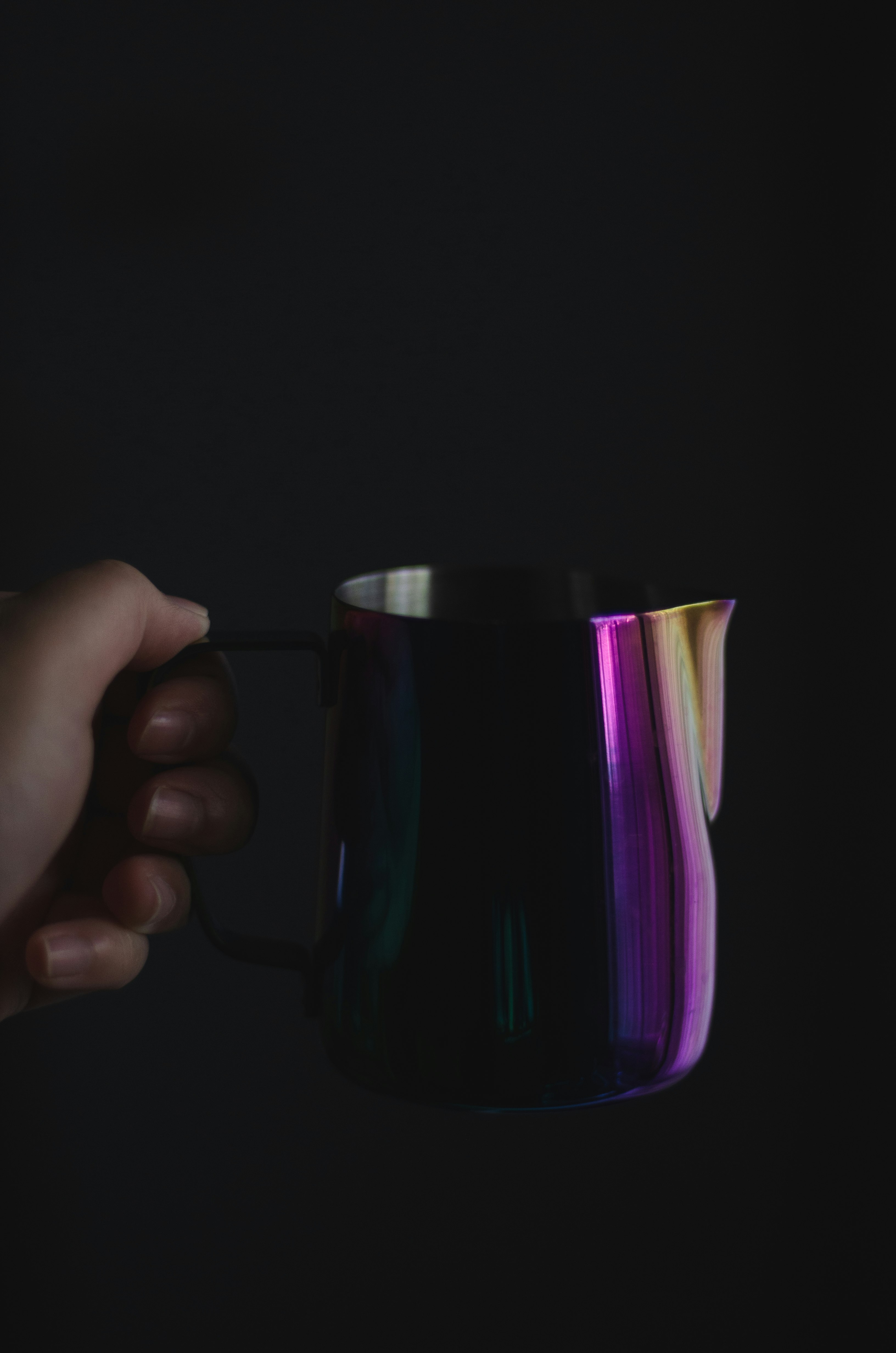 purple and black ceramic mug